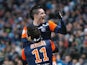 Montpellier's Emanuel Herrera is congratulated by Remy Cabella after a goal against Marseille on January 19, 2013