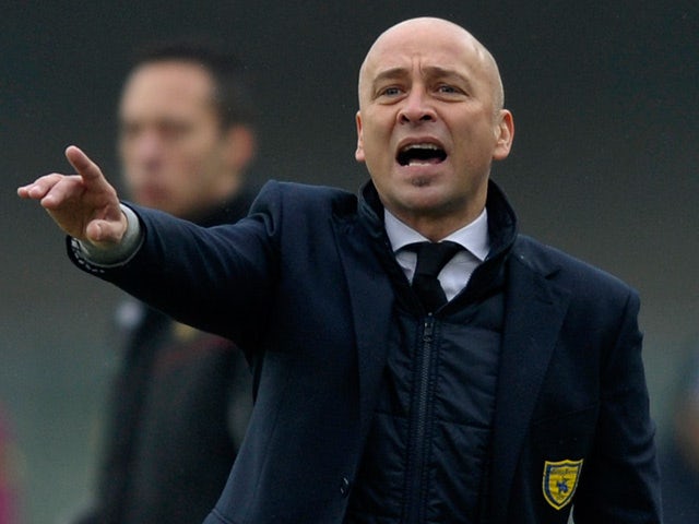 Chievo coach Eugenio Corini gestures to his players during the match against Parma on January 20, 2013