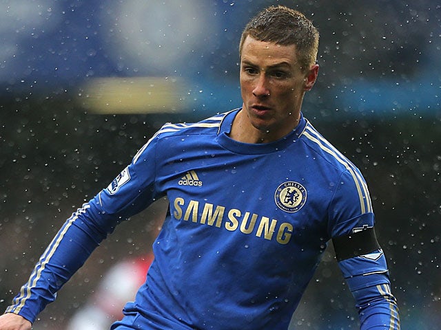 Chelsea's Fernando Torres sporting a new haircut in action during the match against Arsenal on January 20 , 2013