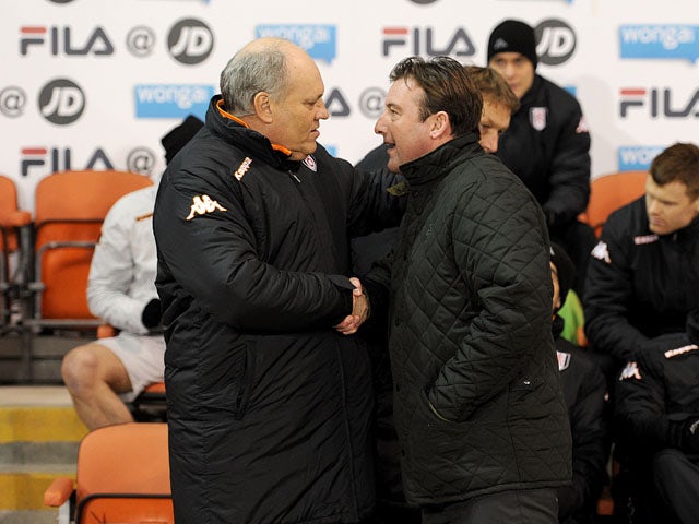 Fulham manager Martin Jol and Blackpool caretaker manager Steve Thompson before their sides FA Cup match on January 15, 2013