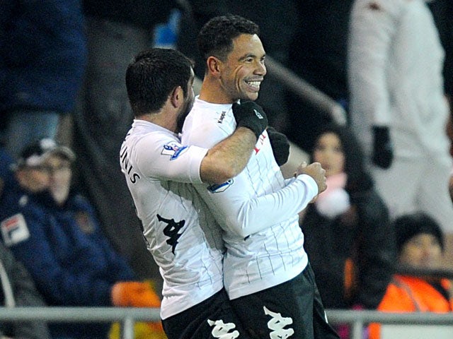 Fulham player Kieran Richardson celebrates scoring a late equaliser in his sides FA Cup third round replay on January 15, 2013