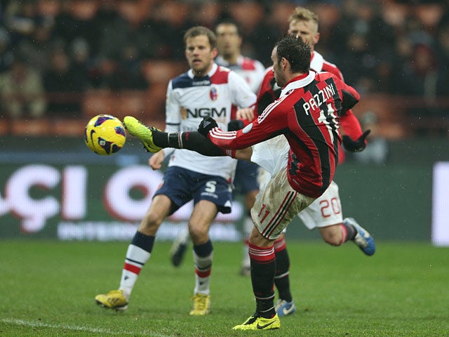 Milan's Giampaolo Pazzini scores his second goal in the match against Bologna on January 20, 2013