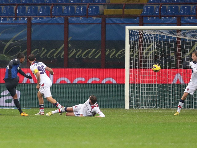 Inter Milan player Fredy Guarin scores during his sides Italian Cup quarter final against Bologna on January 15, 2013