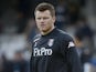 Fulham defender John Arne-Riise warms up before the game with QPR on December 15, 2012