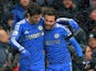 Juan Mata celebrates with team mate Emboaba Oscar after scoring the opening goal against Arsenal on January 20, 2013