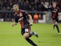 Leverkusen's Sidney Sam celebrates scoring during his sides Champions League tie with Valencia on October 19, 2013