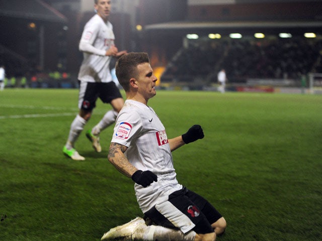 Leyton Orient's Dean Cox celebrates scoring for his side in their FA Cup third round replay on January 15, 2013