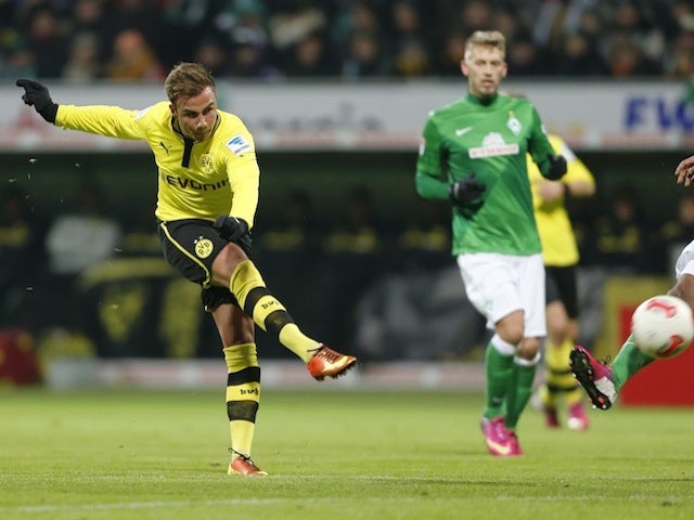 Dortmund's Mario Gotze scores a goal against Werder Bremen on January 19, 2013