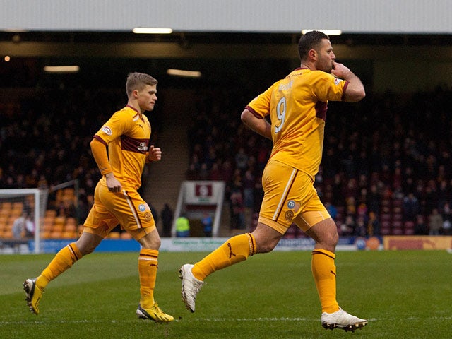 Motherwell's Michael Higdon celebrates his first against St Johnstone on January 20, 2013