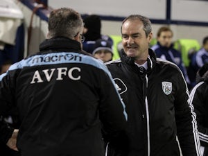 Opposing managers Paul Lambert & Steve Clarke shake hands before kick-off between Villa and West Brom on January 19, 2013