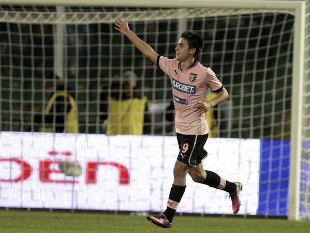 Palermo's Paulo Dybala celebrates his goal against Lazio on January 19, 2013