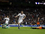 Karim Benzema celebrates scoring for Real Madrid in their Copa del Rey clash with Valencia on January 15, 2013