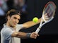 Federer brushes Tomic aside