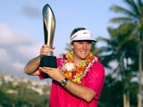 Russell Henley poses with the Sony Open trophy in Hawaii on January 13, 2013