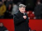 West Ham manager Sam Allardyce leaves the field at the final whistle after losing against Manchester United during the FA Cup third round replay on January 16, 2013