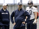 Seattle Seahawks defensive coordinator Gus Bradley stands on the field during his sides practice on January 10, 2013