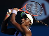 Sloane Stephens hits a backhand return to Laura Robson in the third round of the Australian Open on January 19, 2013