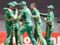 Graeme Smith is congratulated by his team after taking the wicket of New Zealand's Martin Guptill during a One Day International game on January 19, 2013