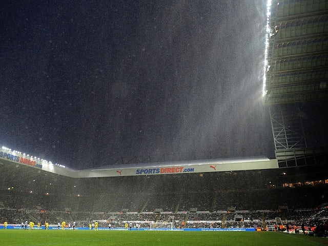 Heavy snow falls at St James' Park during the game between Newcastle and Reading on January 19, 2013