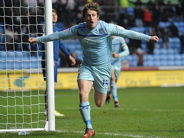 Coventry's Stephen Elliott celebrates scoring the opening goal against Oldham on January 19, 2013