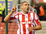 Stoke City player Jon Walters celebrates scoring his sides second goal in their FA Cup third round replay on January 15, 2015
