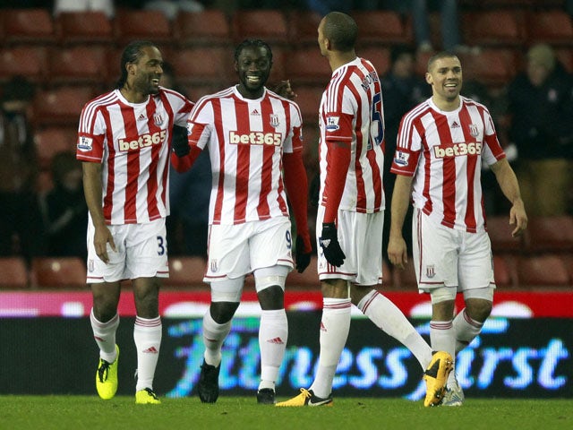 Stoke City player Kenwyne Jones celebrates with teammates after scoring in his sides FA Cup match on January 15, 2013