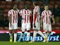 Stoke City player Kenwyne Jones celebrates with teammates after scoring in his sides FA Cup match on January 15, 2013