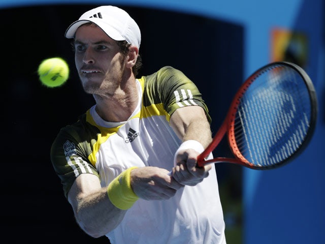Britain's Andy Murray returns a shot during his first round clash with Robin Haase at the Australian Open tennis championship on January 15, 2013
