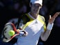 Britain's Andy Murray hits a forehand return during his third round match at the Australian Open tennis championship on January 19, 2013
