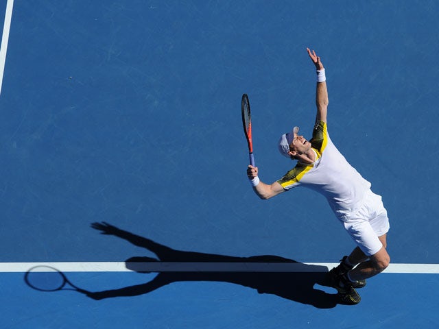 Britain's Andy Murray serves to Ricardas Berankis during their third round match at the Australian Open tennis championship on January 19, 2013