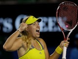 German Angelique Kerber celebrates after winning her third round match against Madison Keys at the Australian Open tennis championship on January 18, 2013