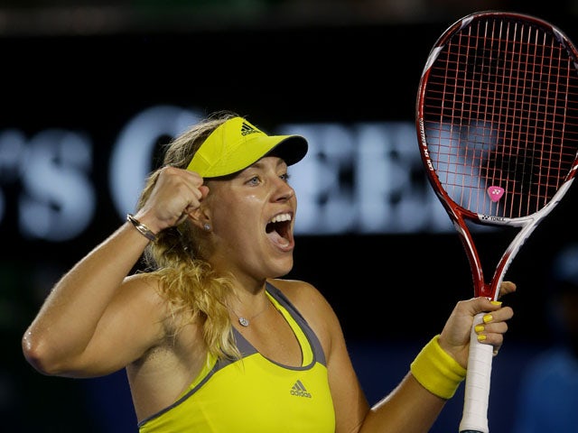German Angelique Kerber celebrates after winning her third round match against Madison Keys at the Australian Open tennis championship on January 18, 2013