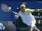 Spain's David Ferrer stretches for a return shot during his second round match with Tim Smyczek at the Australian Open tennis championship on January 16, 2013
