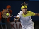 Spain's David Ferrer makes a forehand return in his third round match at the Australian Open tennis championship on January 18, 2013