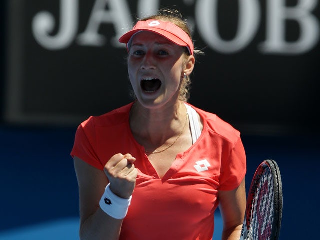 Russia's Ekaterina Makarova celebrates winning the first set against Angelique Kerber in the fourth round of the Australian Open tennis championship on January 20, 2013