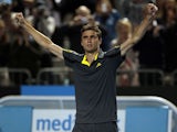 France's Gilles Simon celebrates after winning his third round match at the Australian Open tennis championship on January 20, 2013