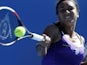 Britain's Heather Watson hits a shot during her second round match at the Australian Open tennis championship on January 16, 2013