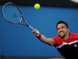 Serbia's Janko Tipsarevic stretches for the ball during his second round match at the  Australian Open tennis championship on January 16, 2013