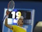 Jarkko Nieminen celebrates defeating Tommy Haas in five-sets at the Australian Open tennis championship on January 15, 2013