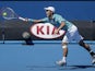 Kei Nishikori of Japan stretches for a shot during his second round match at the Australian Open tennis championship on January 16, 2013
