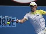 South African Kevin Anderson hits a forehand shot during his third round match against Fernando Verdasco at the Australian Open tennis championship on January 18, 2013