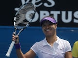 China's Li Na celebrates after defeating Sorana Cirstea in the third round of the Australian Open tennis championship on January 18, 2013