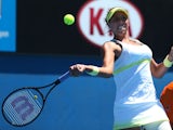 Madison Keys makes a forehand return in her second round match with Tamira Paszek at the Australian Open tennis championship on January 16, 2013