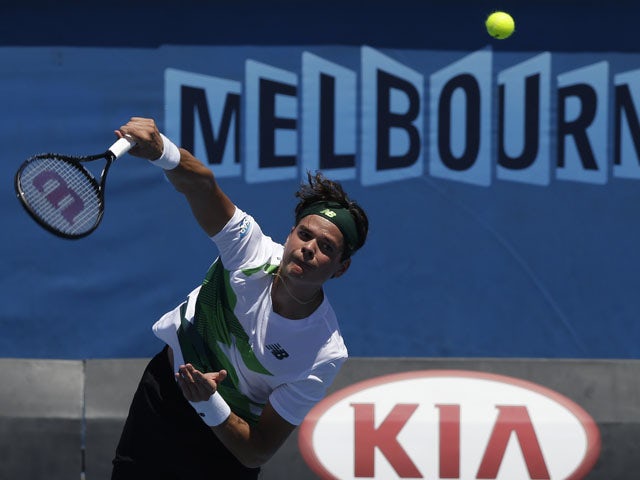 Raonic comes from behind to defeat Hajek