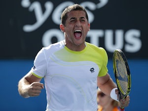 Spain's Nicolas Almagro celebrates during his third round match with Jerzy Janowicz at the Australian Open tennis championship on January 18, 2013