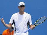 Sam Querrey reacts after losing a point in his second round match with Brian Baker at the Australian Open tennis championship on January 16, 2013