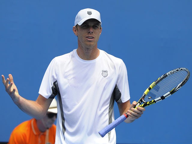 Sam Querrey reacts after losing a point in his second round match with Brian Baker at the Australian Open tennis championship on January 16, 2013