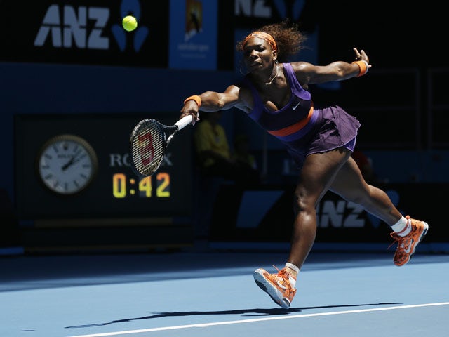 Serena Williams stretches for the ball in her first round match with Edina Gallovits-Hall at the Australian Open tennis championship on January 15, 2013