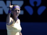 Victoria Azarenka from Belarus celebrates defeating Monica Niculescu in the first round of the  Australian Open tennis championship on January 15, 2013