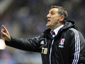 Mowbray coy over playoff chances